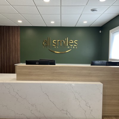 Reception desk at All Smiles Dental Centre