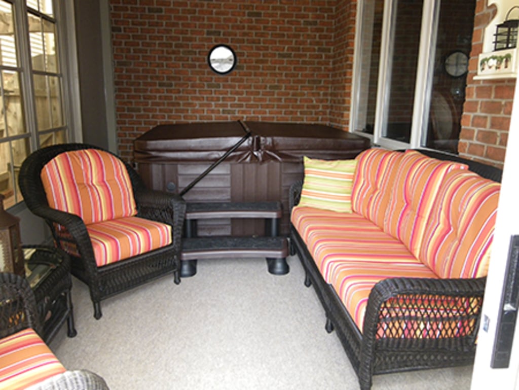 Spa in enclosed seating area	