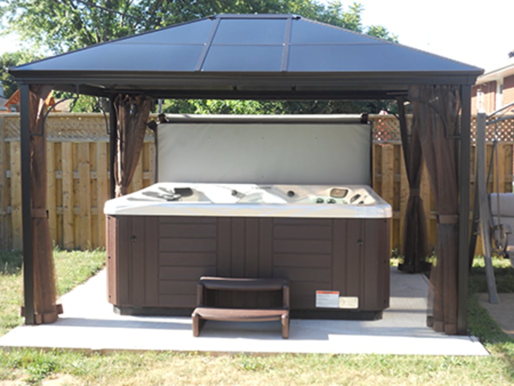 Outdoor spa under a gazebo