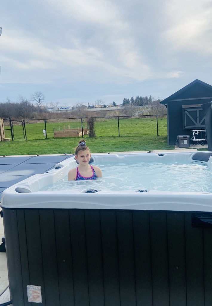 Young girl enjoying the family spa