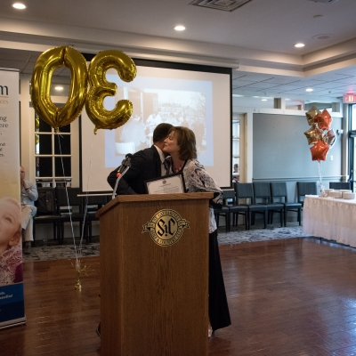 Mayor Sendzik Presents 30th Anniversary Plaque to Lori Beech